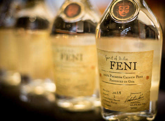 Indulge in the unique taste of Goan Feni, a popular local spirit, on your West Coast road trip.